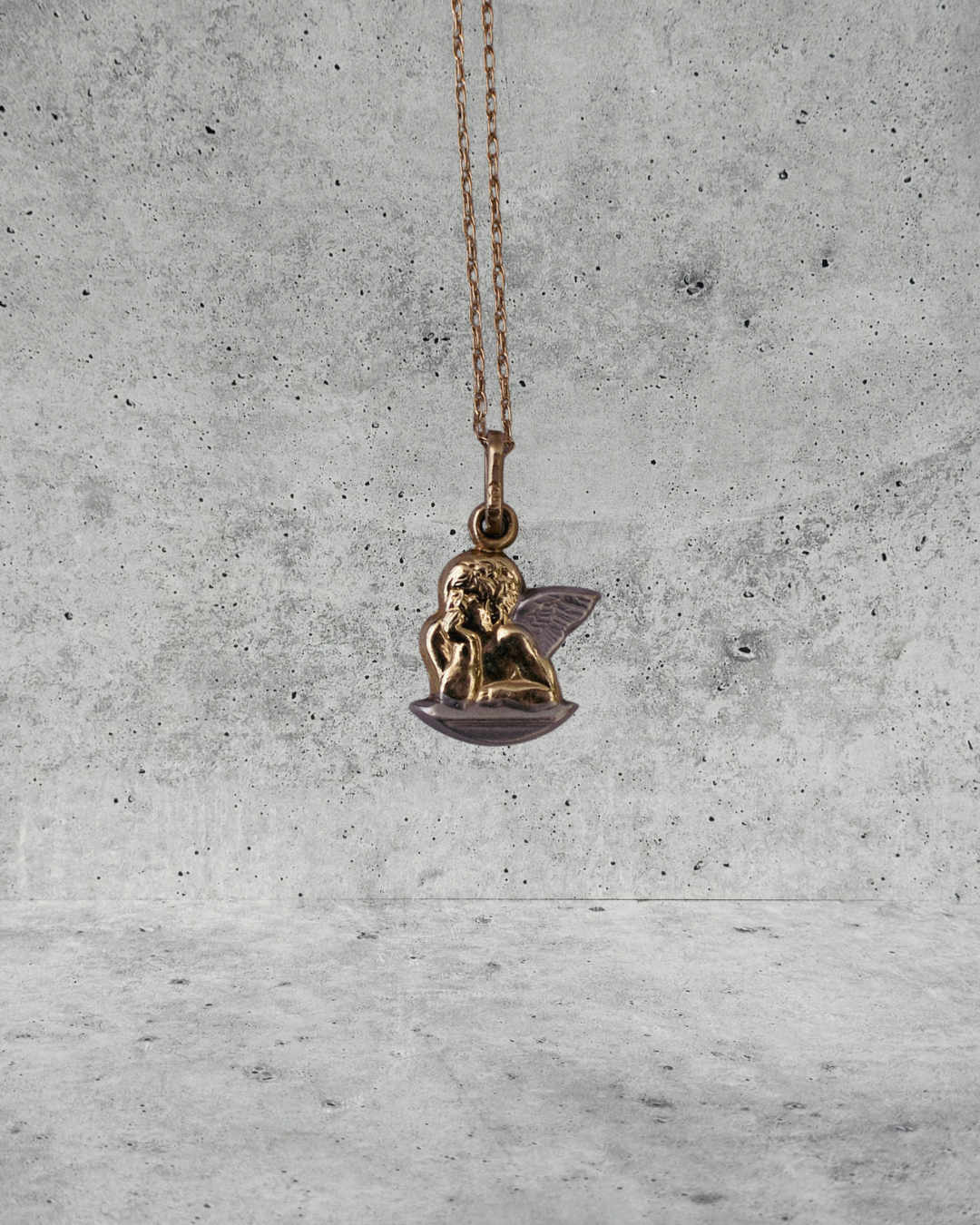 Pondering Cherub Necklace